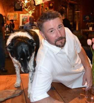 photo of Eric Dunham, Founder and Founding Winemaker, and Dog Munch